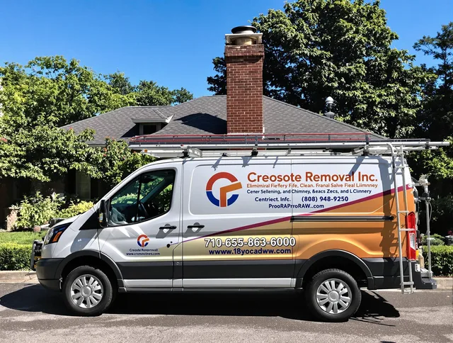 Orange Chimney Sweep technician removing creosote safely in Orange, CT